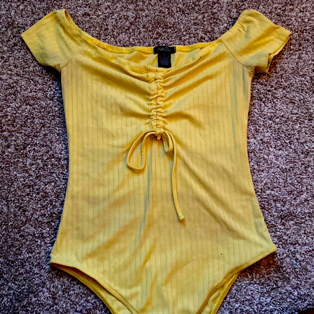 Yellow off the shoulder body suit